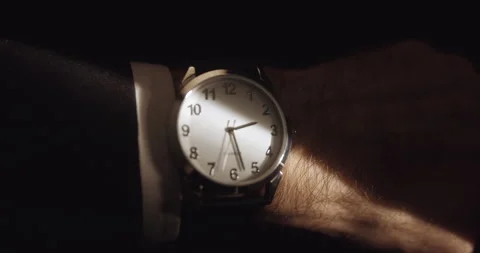 Watch Face in Sliver of light Stock Footage 220683054