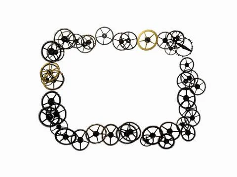 Watch gears, small precision made cog wheels arranged in a rectangular frame  Stock Photos