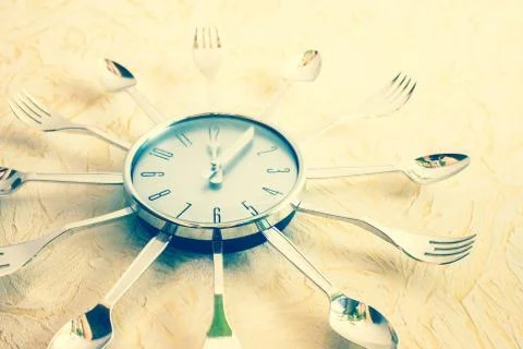 Watch in the kitchen. Stock Photos