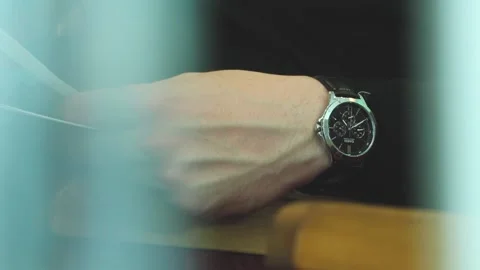 Watch on a man's hand Stock Footage 151349160