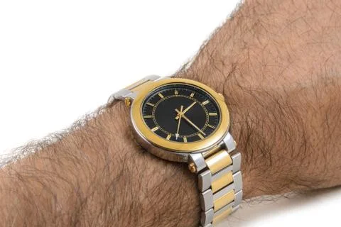	The watch on the man's hand Stock Photos