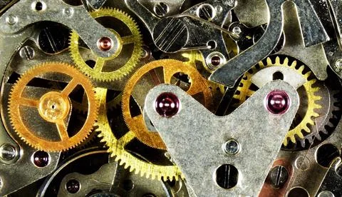 The watch is mechanical, a view of the details from the inside. Stock Photos