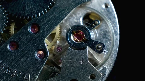 Watch mechanism macro loop.Old vintage clock mechanism working Stock Footage 101337060
