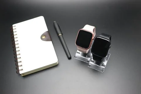 Watch with a notebook Stock Photos