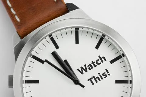 Watch with text Watch This. Stock Photos