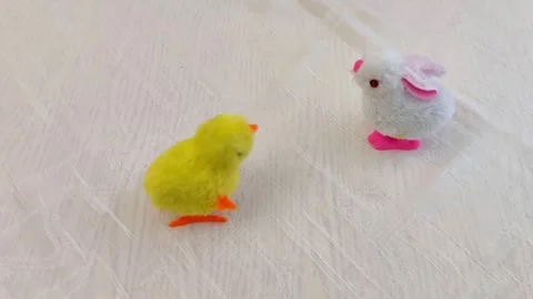 Watch These Tiny Wind - Up Toys Hop. Cute Easter Chick Bunny Fun Video stock 327587002