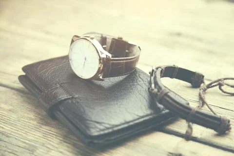 Watch on wallet Stock Photos