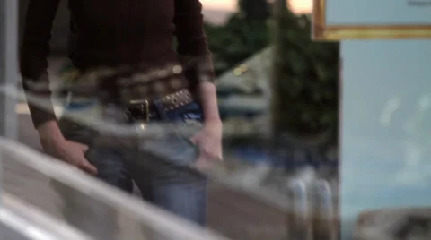 Watches in a display window, model walking by Stock Footage 36759388