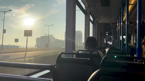 Watching from the bus window to see city view in the morning Video stock 246057955