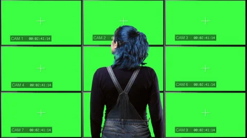 Watching CCTV Monitors Surveillance System Green Screen Television Split Screen Stock-Footage 166090146