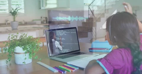 Watching child in purple top headset following laptop teacher writing at home, Video stock 332281430