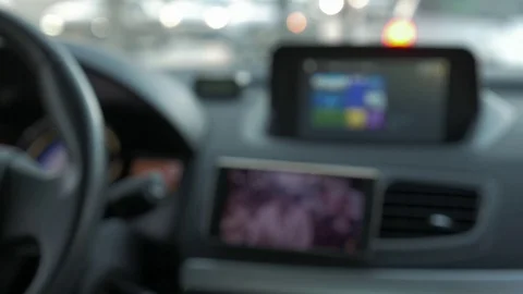 Watching the clip on smartphone while driving. 스톡 동영상 76808365