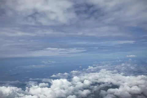 Watching the clouds from the height Stock Photos