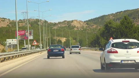 Watching the fields and the sky from the car window. Stock Footage 165371125