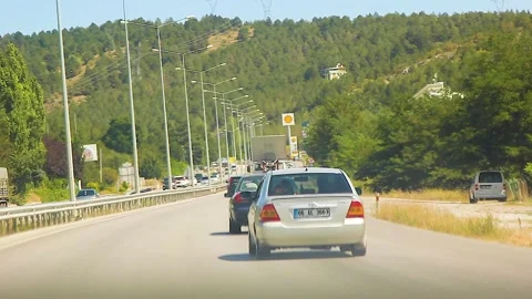 Watching the fields and the sky from the car window. Stock Footage 165375013