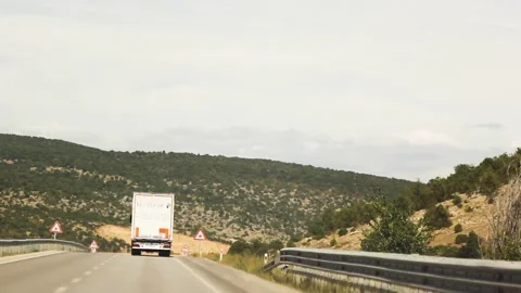 Watching the fields and the sky from the car window. Stock Footage 165375185
