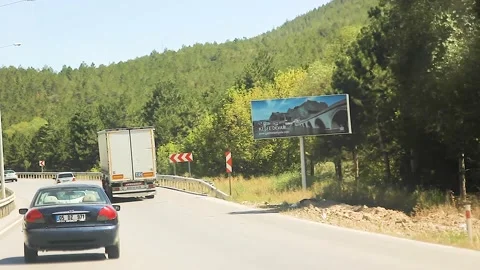 Watching the fields and the sky from the car window. Stock Footage 165376492