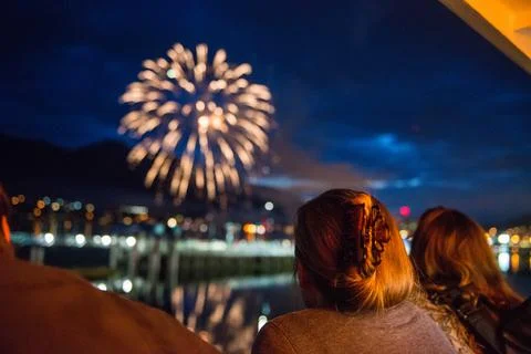 Watching fireworks on 4th of july Stock Photos