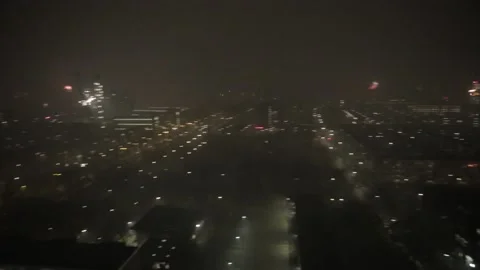 Watching Fireworks exploding from a balcony on New Years Stock Footage 147677618
