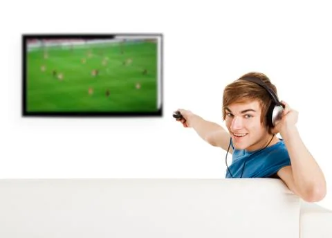 Watching football on tv Stock Photos