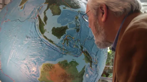 Watching a globe circular in a museum Stock Footage 36150751