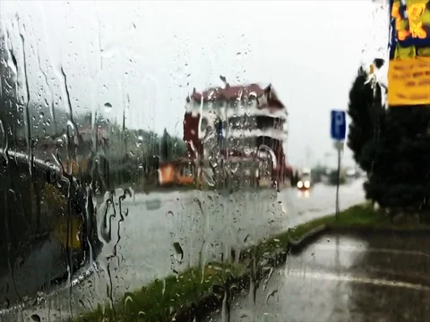 Watching the heavy rain and thunder from a car Stock Footage 71315611
