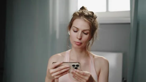 Watching How to do a Yoga Exercises Correctly 스톡 동영상 306017441