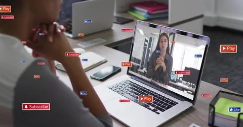 Watching image tutorial, person surrounded by play and subscribe buttons image 스톡 사진