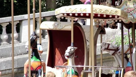 Watching a merry go round Stock Footage 78532456