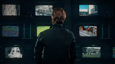 Watching Multiscreen Television Monitors Spinning, Shot Behind Model Stock Footage 161784884