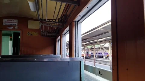 Watching the passing scenery outside the train window, Bangkok Stock Footage 341781862