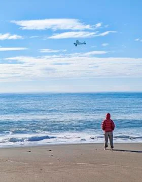 Watching the plane Stock Photos