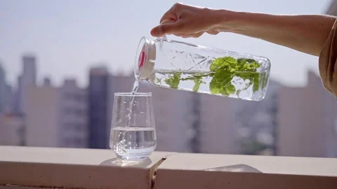 Watching the process of preparing mint water in Benidorm on a sunny day Stock Footage 337152010