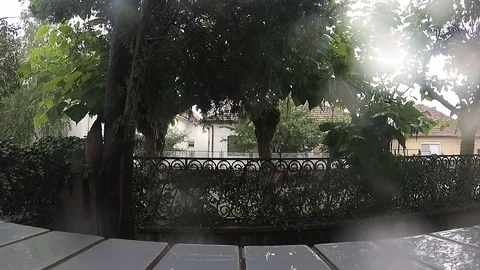 Watching the rainy day through the window Stock Footage 91460278
