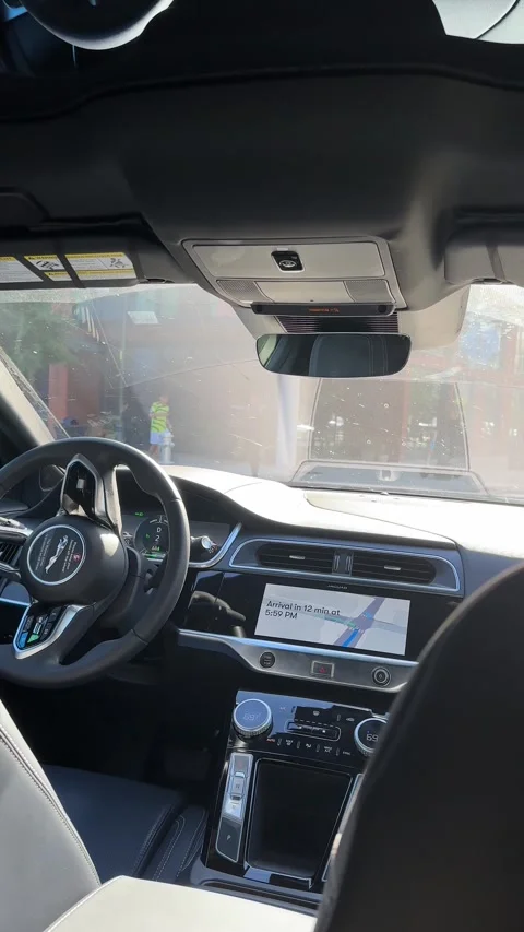 Watching a self-driving car take me throgh the streets of Austin Stock Footage 306763118