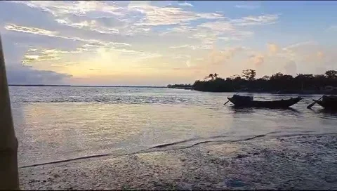Watching the sky at dusk on the beach Stock Footage 279052828