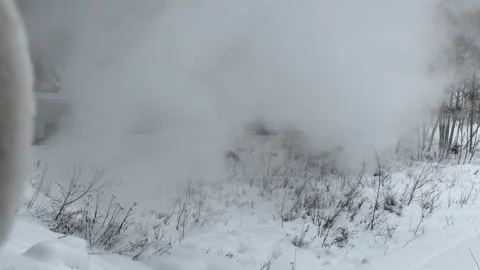 Watching Steam Train Through Snowy Landscape During Winter Journey Stock Footage 341764539