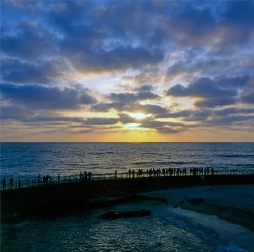 Watching sunset Stock Photos