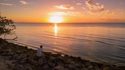 Watching the sunset Stockfoto's