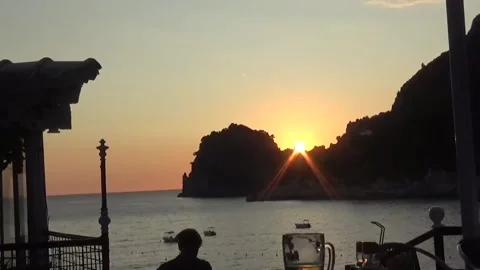 Watching the sunset from a restaurant Vídeos de archivo 307380835