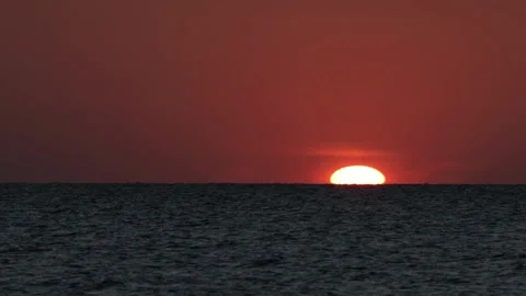 Watching Sunset By The Sea In The Evening Stock Footage 141923586