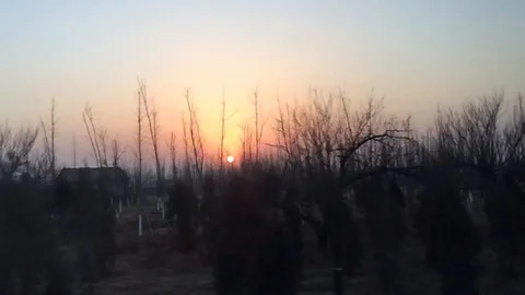 Watching the sunset on a vehicle Stock Footage 128911786