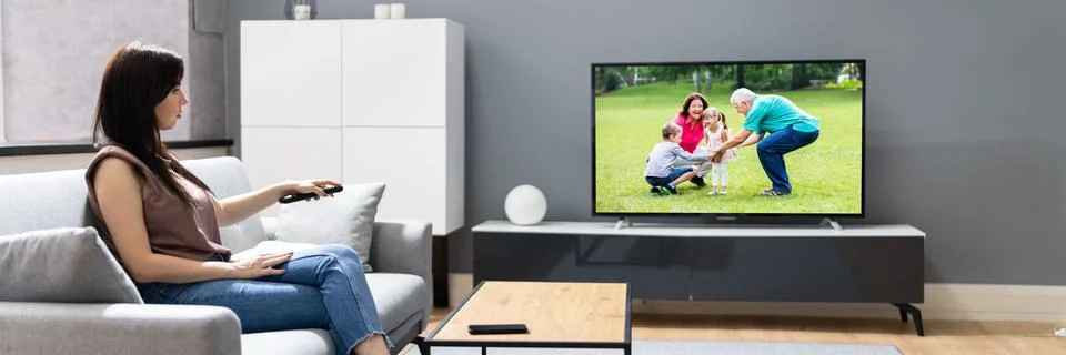 Watching TV Movie On Television Stock Photos