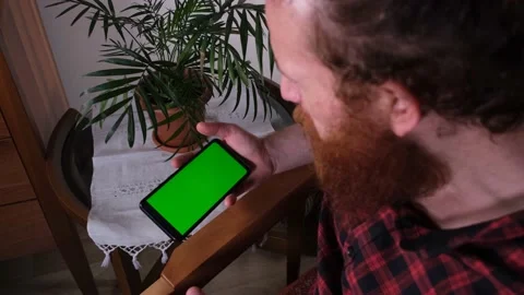 Watching video, green screen Stock Footage 197379467