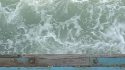 Watching waves and bubbles from a platform of an old ferry (50fps) 스톡 동영상 296364238