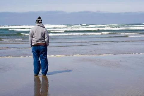 Watching the waves Stock Photos
