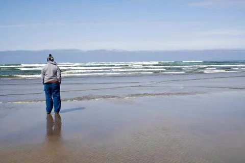 Watching the waves 스톡 사진