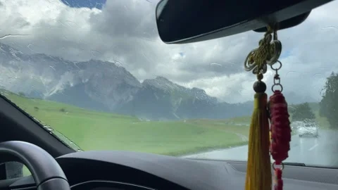 Watching from wind shield, raining weather during travel Stockbeeldmateriaal 284463072