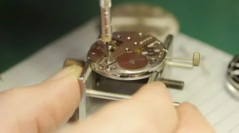 Watchmaker assembles a watch Stock Footage 21675118