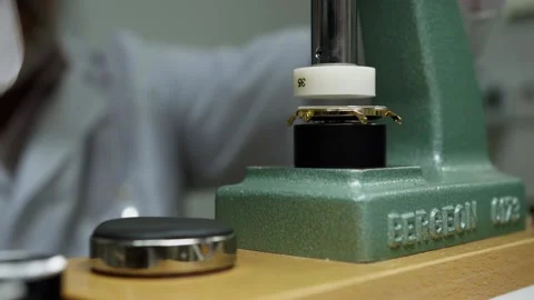 Watchmaker assembling a golden watch. Stock Footage 167573633